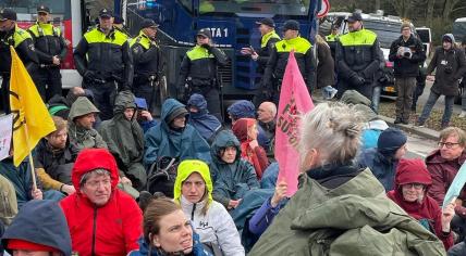 XR activists blocking the A12 in the Hague, February 2024. 