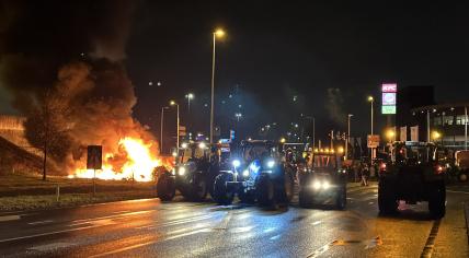 Farmers protest on the A12 near Veenendaal - protesters set a fire next to the highway and blocked the road with tractors, 5 February 2024