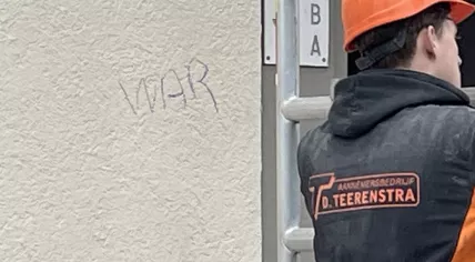 The word "war" written on a wall at the scene of an explosion on Populierenweg in Amsterdam, 28 February 2024