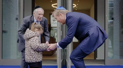 Holocaust survivor Rudie Cortissos, his great-granddaughter and King Willem-Alexander at the opening of the National Holocaust Museum in Amsterdam, 10 March 2024