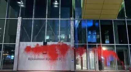 Pro-Palestinian protestors smear red paint across a Ministry of Foreign Affairs building on Rijnstraat in The Hague. 18 March 2024