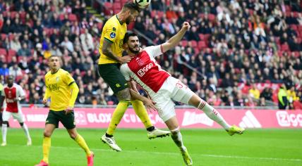 Mitchell Dijks of Fortuna Sittard, Josip Sutalo of Ajax during the Dutch Eredivisie match between Ajax Amsterdam and Fortuna Sittard at the Johan Cruijff ArenA on March 10, 2024 in Amsterdam, Netherlands.