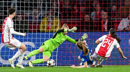 Sjoeke Nusken of Chelsea FC scores the 0-2 during the UEFA Champions League Women's Quarterfinal match between Ajax and Chelsea FC at the Johan Cruijff ArenA on March 19, 2024 in Amsterdam, Netherlands