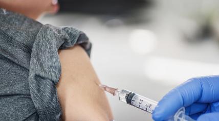 Cropped view of a boy getting a vaccination