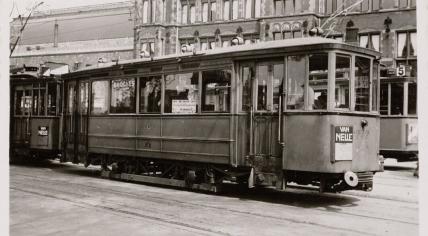 A tram on line 24 alongside tram line 5 in front of Centraal Station in Amsterdam. 23 March 1941