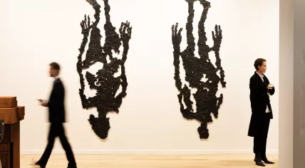 Vistors walking through the White Cube gallery space at TEFAF Maastricht in 2023