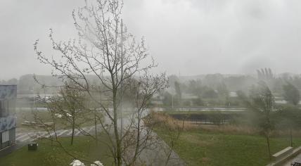 Strong wind gusts, heavy rain and hail accompany lightning in the skies over Amsterdam-Oost. 15 April 2024