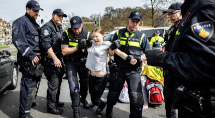 Climate activist Greta Thunberg detained at 12 blockade in The Hague, April 2024.