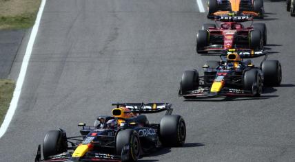 Red Bull driver Max Verstappen, left, of the Netherlands leads the field shortly after the start of the Japanese Formula One Grand Prix at the Suzuka Circuit in Suzuka, central Japan, Sunday, April 7, 2024.