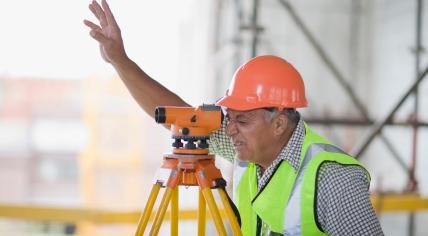 Older worker with leveling board