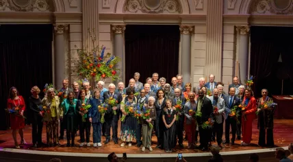 Amsterdam mayor Femke Halsema with all the city residents who received a royal distinction during the lintjesregen, 26 April 2024