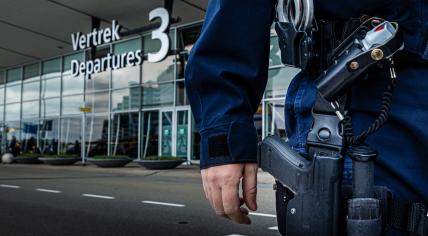 A Koninklijke Marechaussee officer at Schiphol Airport