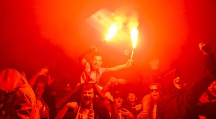 FC Groningen fans celebrate as their team marched their way into the Eredivisie defeating Roda JC in the Euroborg stadium in Groningen. 10 May 2024