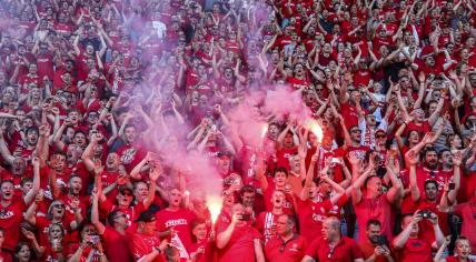 FC Twente supporters in Enschede celebrate the victory over FC Volendam, keeping Twente in the running for a Champions League spot in the 2024-2025 season, 12 May 2024