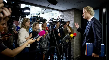 Geert Wilders tells reporters that the PVV, VVD, NSC and BBB have a deal to form a new coalition. 15 May 2024