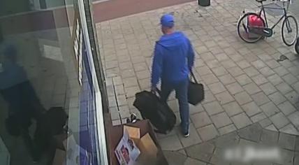 Camera images of the man suspected of murdering Piet Hoovers and his wife Tae on July 15, 2017. 