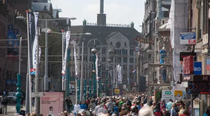 The crowded Damrak shopping street in Amsterdam