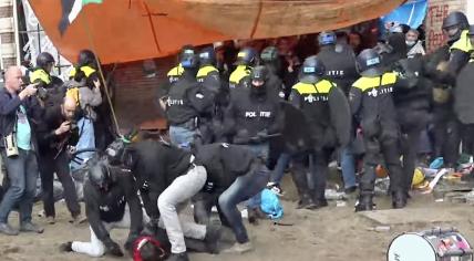 Police break up a pro-Palestinian demonstration that occupied several city center buildings at the University of Amsterdam. 8 May 2024