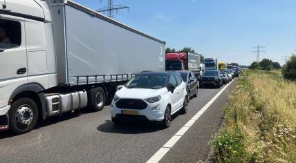 Traffic backed up after two people were killed in a crash between a car and truck on the A73 in Nijmegen. 26 June 2024