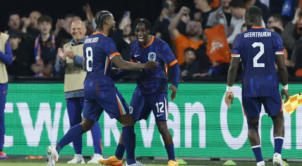 Jeremie Frimpong of the Netherlands (12) celebrates the 2-0 during the friendly match between the Netherlands and Canada at Feyenoord Stadium de Kuip on June 6, 2024 in Rotterdam, Netherlands.