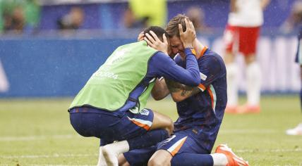 Cody Gakpo of Holland, Wout Weghorst of Holland celebrate the 1-2 victory after the UEFA EURO 2024 group D match between Poland and the Netherlands at the Volksparkstadion on June 16, 2024 in Hamburg, Germany.