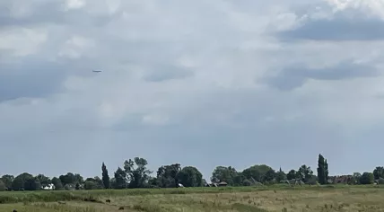 Boeing 777 spotted in Broek in Waterland, Noord-Holland, on its way back to Schiphol Airport.