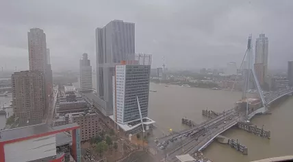 Stormy weather blows past the Erasmus Bridge in Rotterdam. 10 June 2024