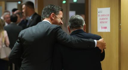 Dutch PM Mark Rutte with his arm around Hungarian PM Viktor Orbán during the a European Council meeting. 30 June 2023