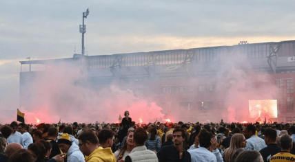 Fans celebrate NAC Breda's promotion to the Eredivisie at the Rat Verlegh Stadion, 2 June 2024