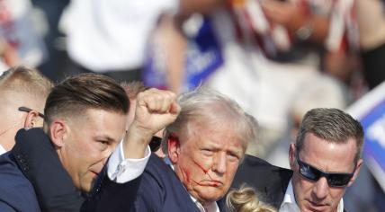 Former US President Donald Trump is taken off the stage by the Secret Service after an assassination attempt during a campaign rally in Pennsylvania.