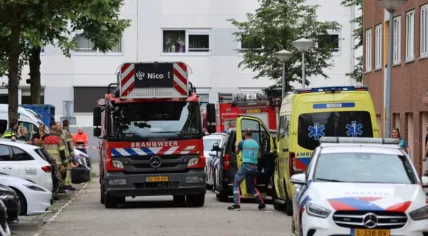 Emergency services at the scene of a fatal stabbing at an apartment building on Hagenau in Amsterdam-Noord, 5 July 2024