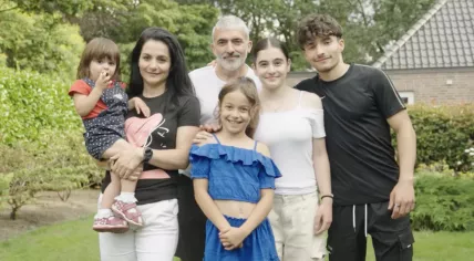 The Babayants family from Uzbekistan after appealing against a rejected asylum application. Aleksa being held by Karine, joined by Amelia in front, with Aleksandr, Aleksa and Aram behind her. July 2024