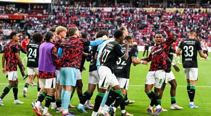 Feyenoord players celebrate the victory during the 28th edition of the Johan Cruijff Shield between PSV Eindhoven and Feyenoord at the Phillips Stadium on August 4, 2024 in Eindhoven, Netherlands