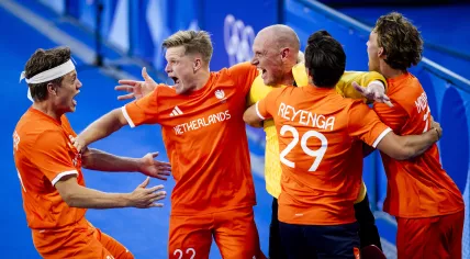 Dutch hockey players celebrate their victory over Germany during the final at the Olympic Games.