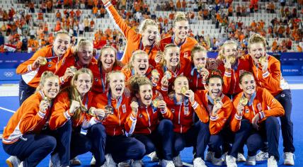 Dutch women's hockey players after receiving their gold medal after winning the final at the Olympic Games.