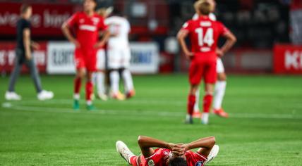 Anass Salah-Eddine of FC Twente is disappointed with the loss during the UEFA Champions League preliminary round match between FC Twente and FC Salzburg at Stadion De Grolsch Veste on August 13, 2024 in Enschede, Netherlands.