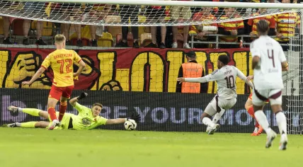 Bialystok, football, Europa League play-offs, Jagiellonia Bialystok - Ajax Amsterdam, In the picture: Mateusz Skrzypczak of Jagiellonia, Slawomir Abramowicz of Jagiellonia, Chuba Akpom of Ajax,