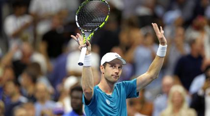 Netherlands' Botic van De Zandschulp celebrates his victory over Spain's Carlos Alcaraz during their men's singles second round tennis match on day four of the US Open tennis tournament at the USTA Billie Jean King National Tennis Center in New York City, on 29 August 2024.