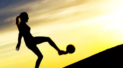 Woman playing football