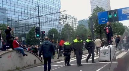 Police on patrol in Rotterdam during the citywide celebration for Feyenoord’s 2022-2023 Eredivisie championship. 16 May 2023