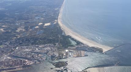 Aerial view of Wijk aan Zee, IJmuiden, and Forteiland in Noord-Holland on a sunny day. 11 August 2024