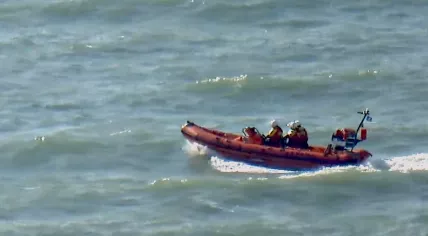 Rescuers search for a missing British swimmer, 19, at the Zuidelijk Havenhoofd pier near the Kijkduin and Scheveningen Beaches in The Hague. 26 August 2024