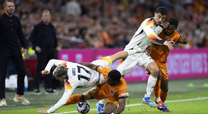 Florian Wirtz of Germany, Quinten Timber of Holland, Kai Havertz of Germany, Jurriën Timber of Holland during the UEFA Nations League match between Netherlands and Germany at Johan Cruyff ArenA on September 10, 2024 in Amsterdam, Netherlands.