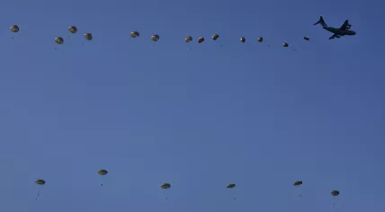 Paratroopers land on the Ginkelse Heide during the commemoration of Operation Market Garden.