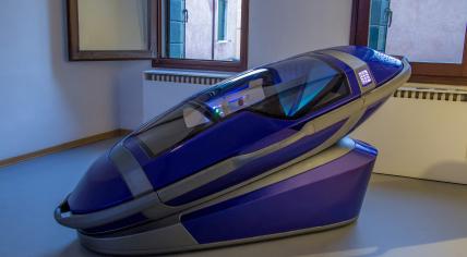 An early version of the Sarco Pod assisted-suicide device on display in Venice, Italy in 2021