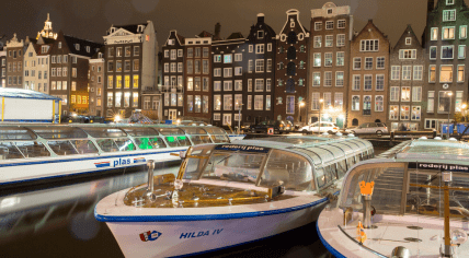 Passenger boats on an Amsterdam canal