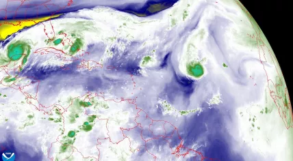 Hurricanes Milton and Leslie and Tropical Storm Kirk seen in infrared satellite imagery. 8 October 2024