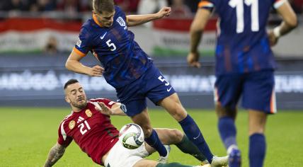 Endre Botka of Hungary, and Micky van de Ven of the Netherlands during the UEFA Nations League match between Hungary and Netherlands at Puskas Arena on October 11, 2024 in Budapest, Hungary.