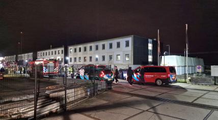 Emergency services at a fire in an asylum shelter on a ship in Zaandam, 31 October 2024