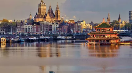 The Sea Palace restaurant on the right as seen from Oosterdok outside of NEMO Science Museum in Amsterdam